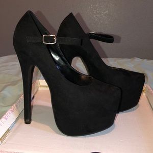 Black suede platform heels